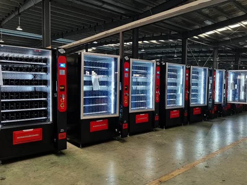 Row of EJR Vending machines lined up in a Dallas-Fort Worth warehouse ready for deployment